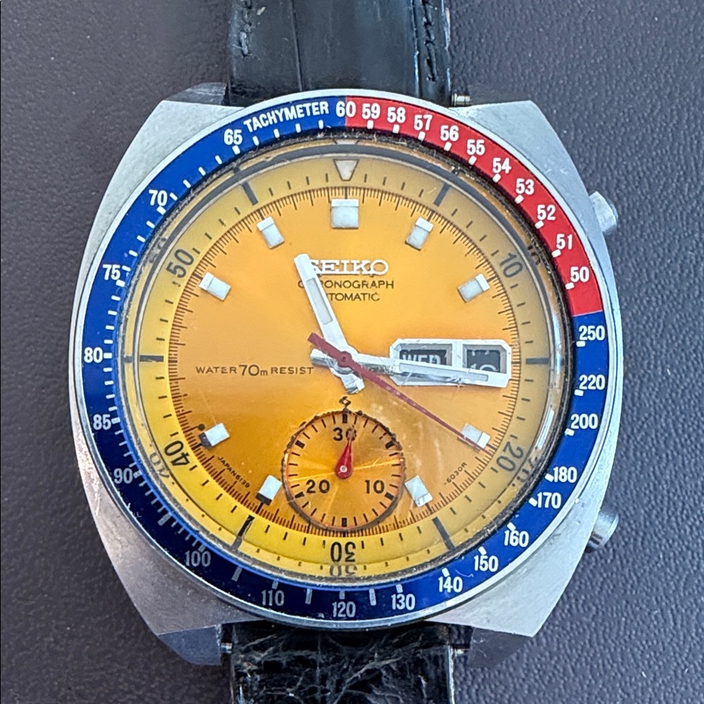 Seiko Stainless Steel Watch with Black Leather Strap